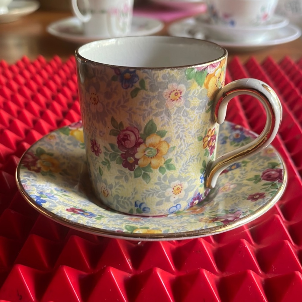 ANTIQUE BCM FLORAL DEMITASSE TEACUP AND SAUCER